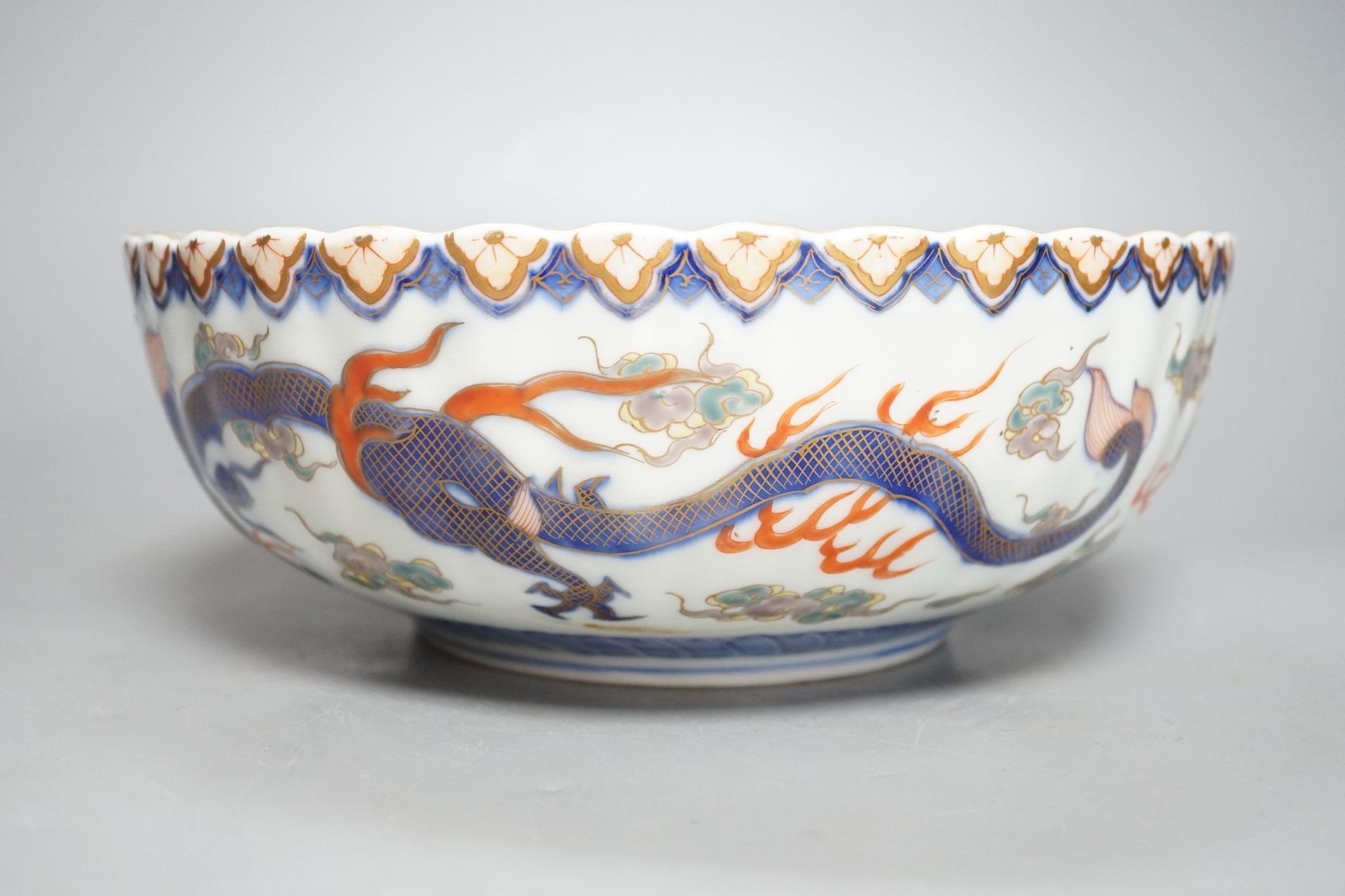 A Japanese Imari petal lobed bowl, by Fukugawa, 25 cms diameter.